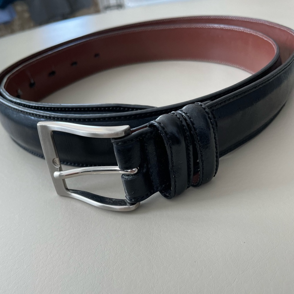 Black mens belt, silver buckle  52 inches long